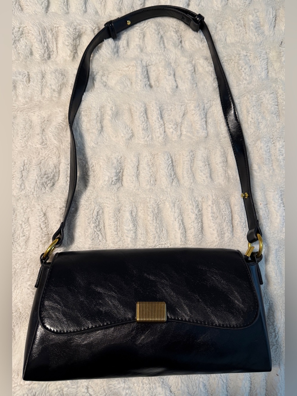 Classic Black Leather Shoulder Bag with Gold Accent